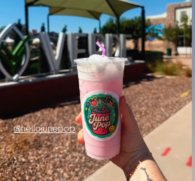 Colorful June Pop product label on a pink beverage cup